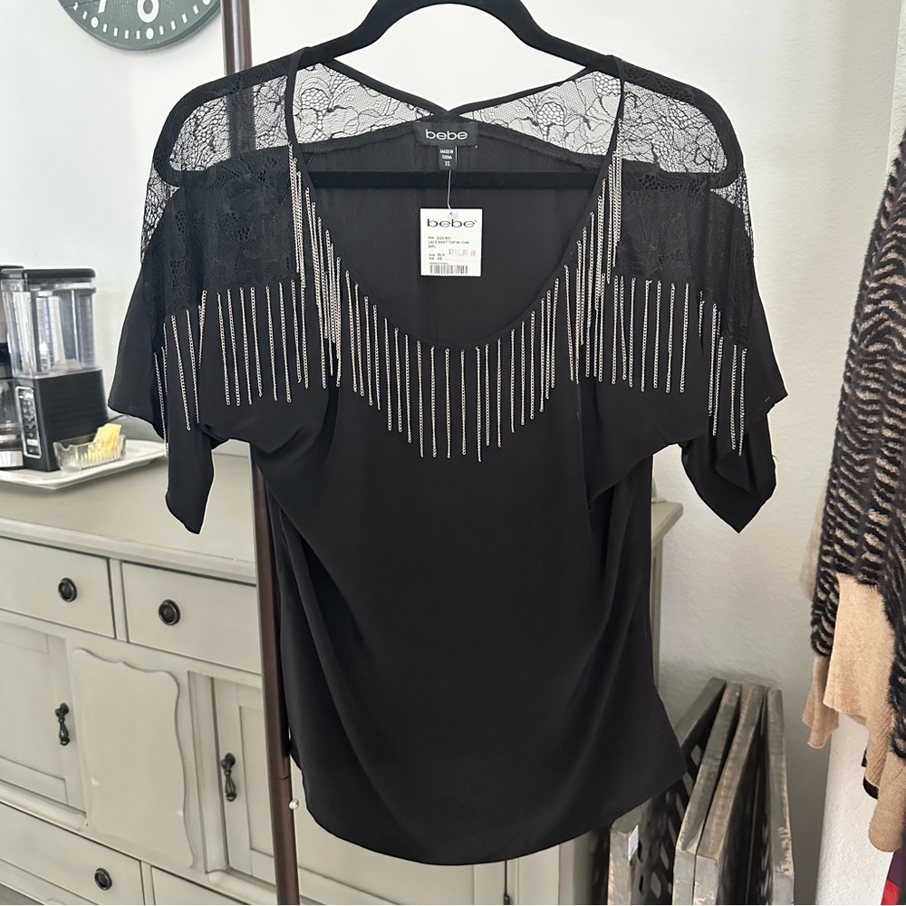 NWT Black BeBe blouse with silver chain fringe